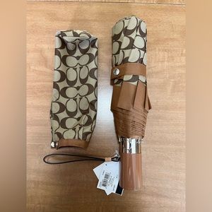 Coach Sig Umbrella. Retractable. New with tags.